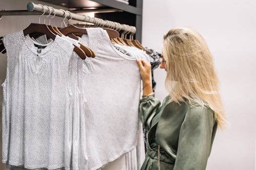 Free Woman Looking at Clothes Stock Photo
