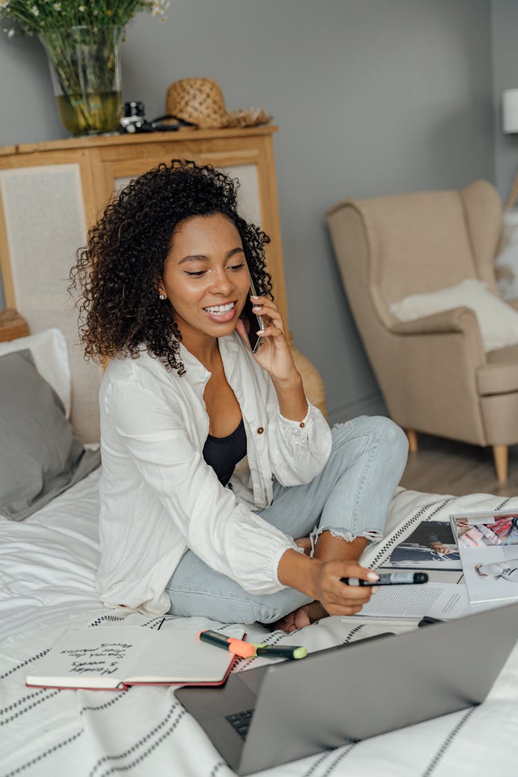 A Woman Talking Into Smartphone 