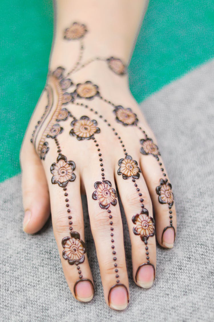 Floral Design Henna Skin Dye On A Bride's Hand