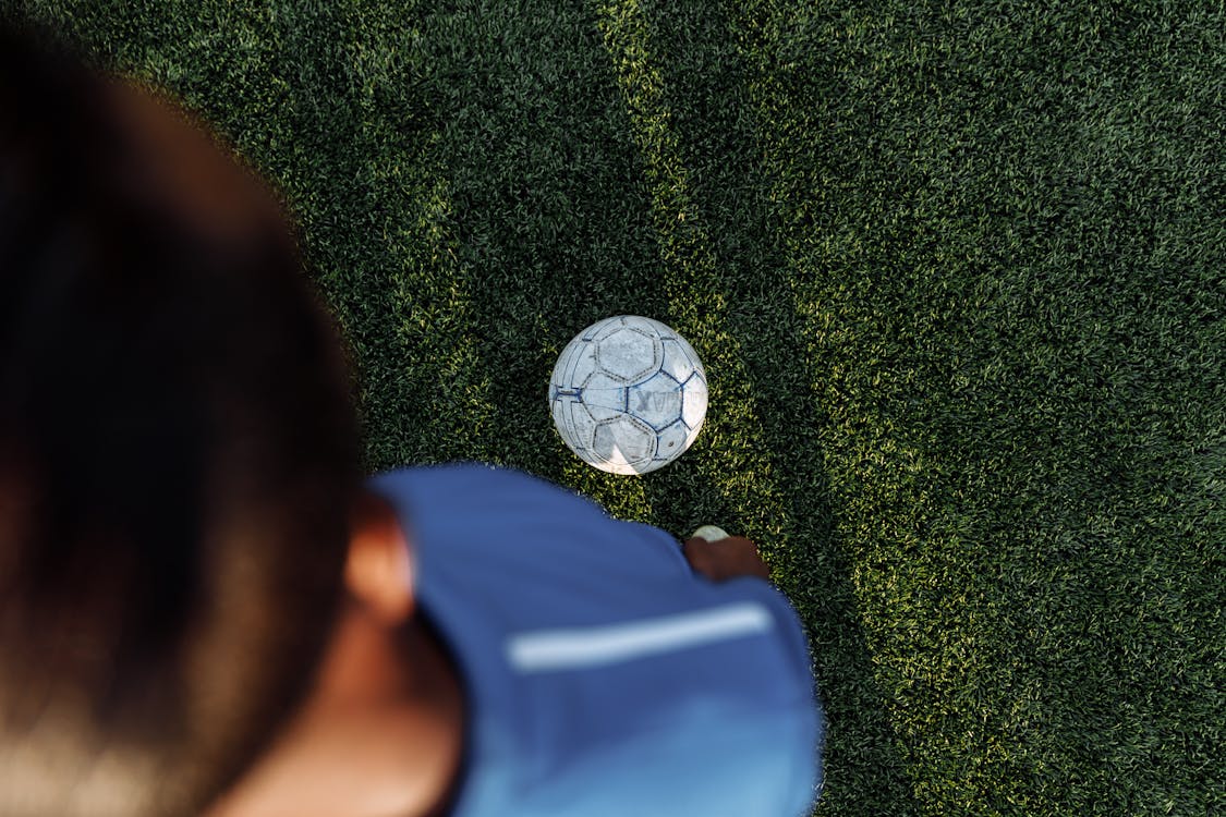 teen playing football