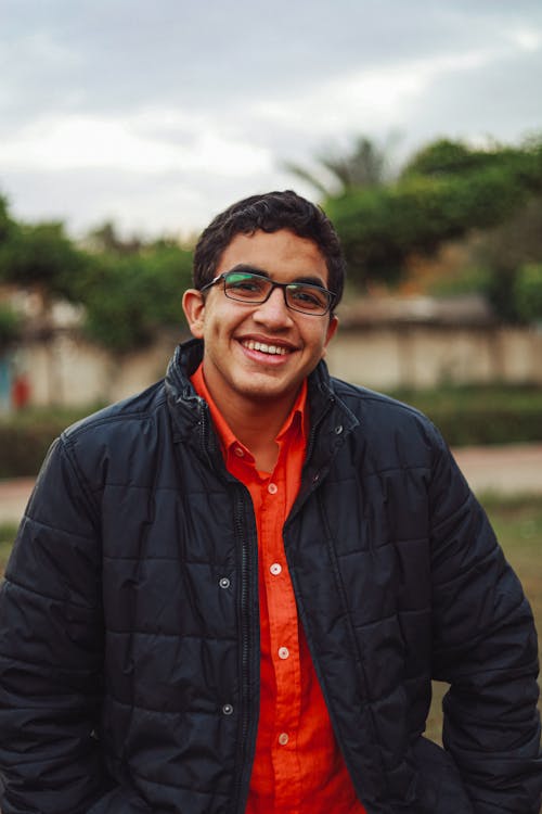Portrait of Smiling Man Wearing Eyeglasses