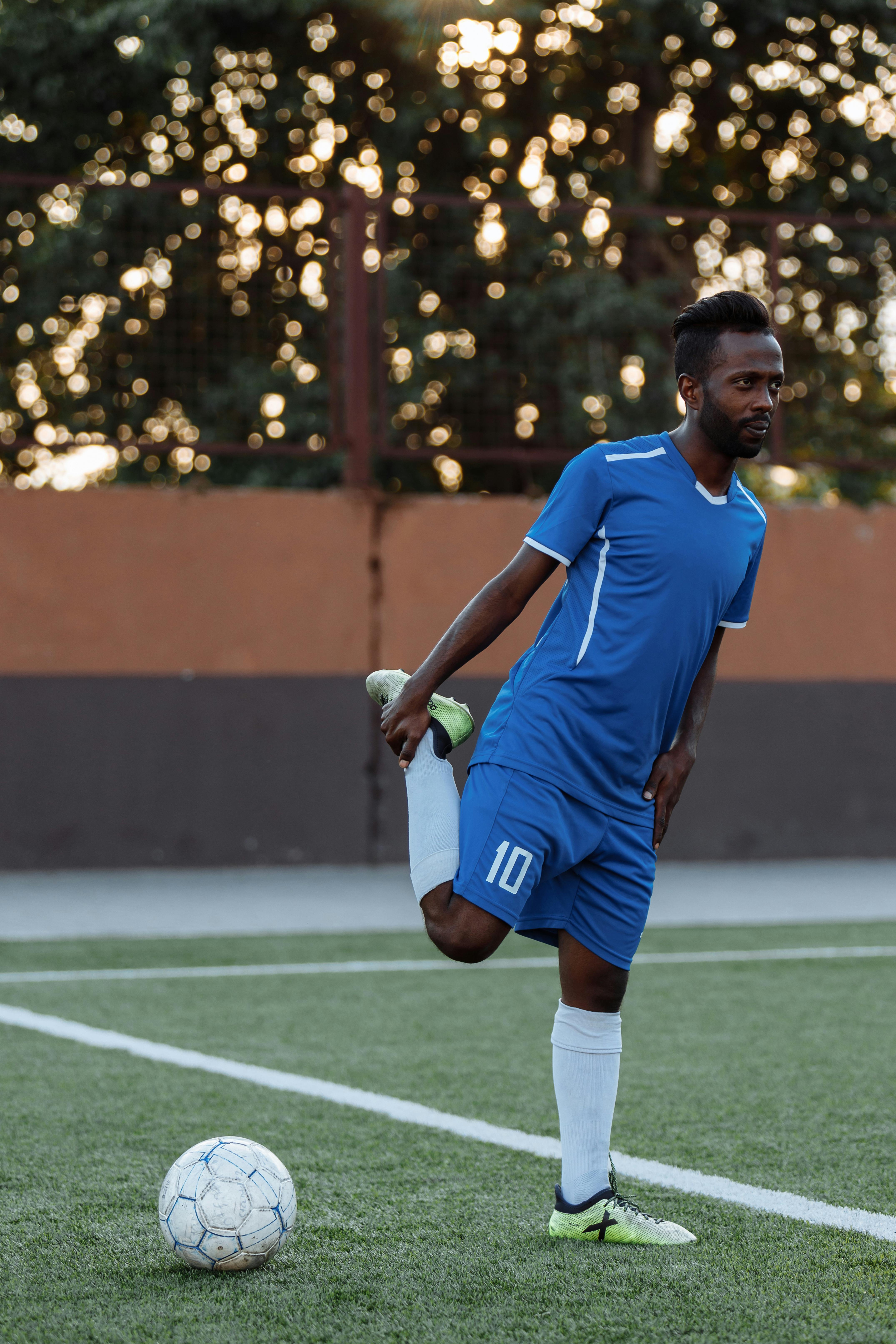 soccer player stretching