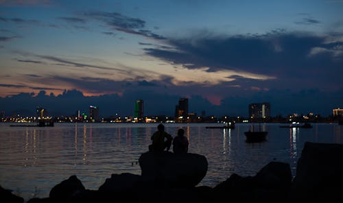 Fotos de stock gratuitas de ciudad, Pareja, puesta de sol