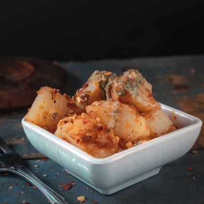 Crispy potato bites with dip — photo by Asfand Munib on Pexels