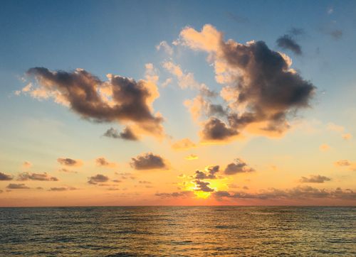 Free Stunning sunset over the Black Sea with vibrant clouds and tranquil waters. Stock Photo