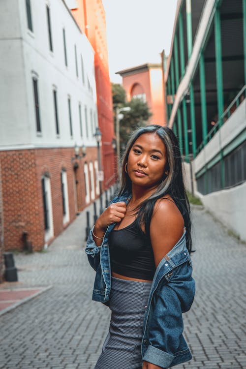 A Woman in Blue Denim Jacket Smiling