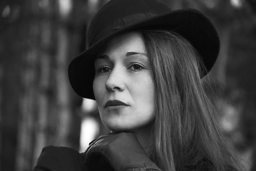 Woman in Cloche Hat and Leather Glove
