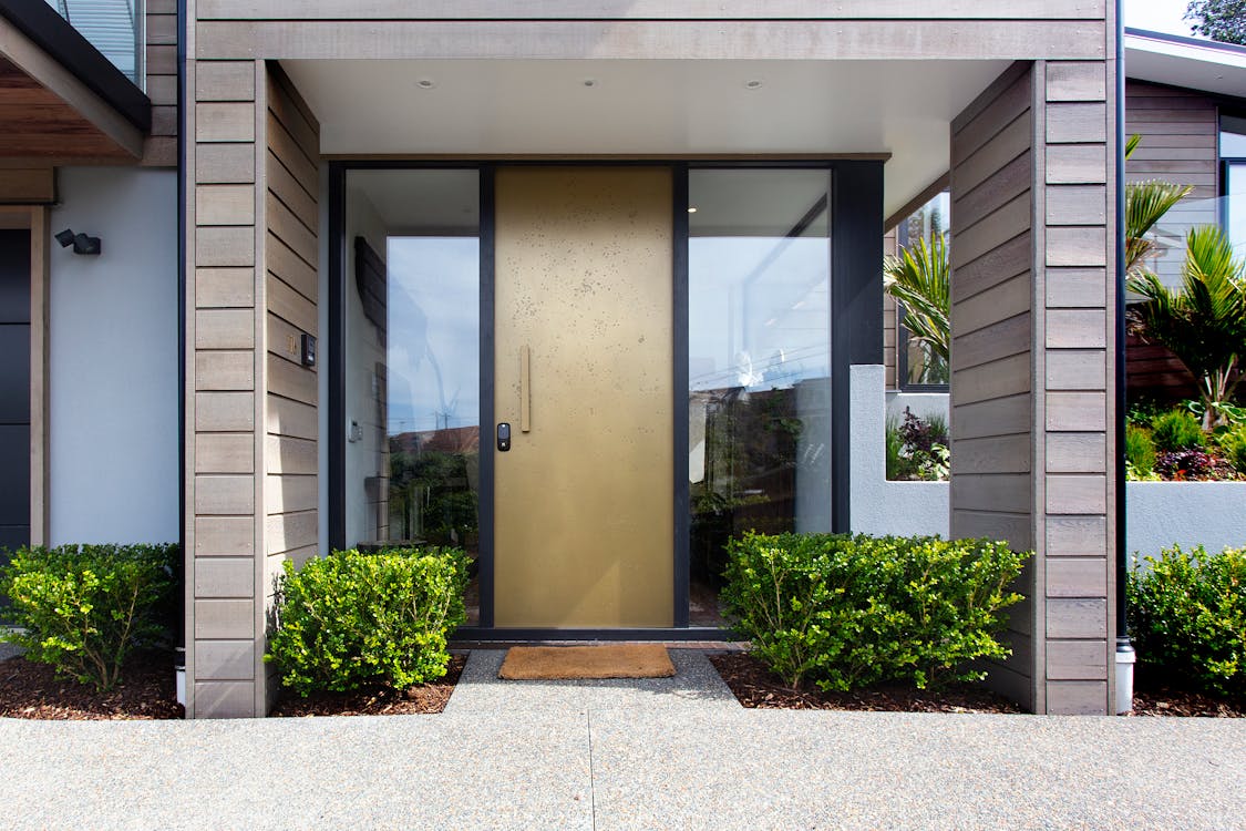 Free Green Plants Near Front Door Of House Stock Photo