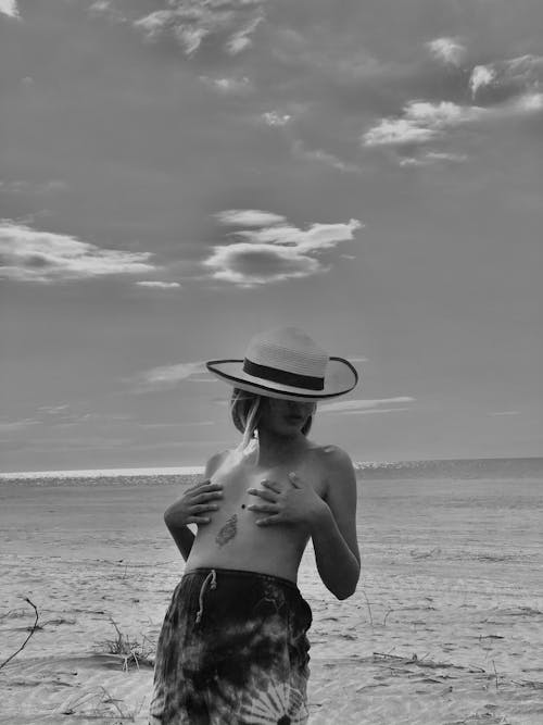 Free Woman Topless on Beach Stock Photo