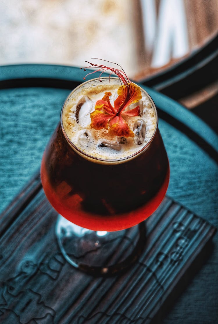 Iced Coffee With A Flower Garnish