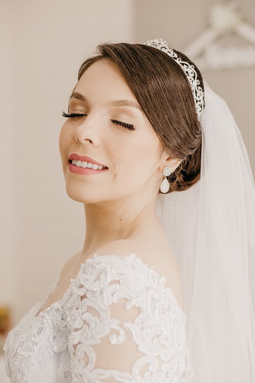 Happy bride with eyes closed · Free Stock Photo
