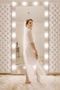 Beautiful bride in long white wedding gown