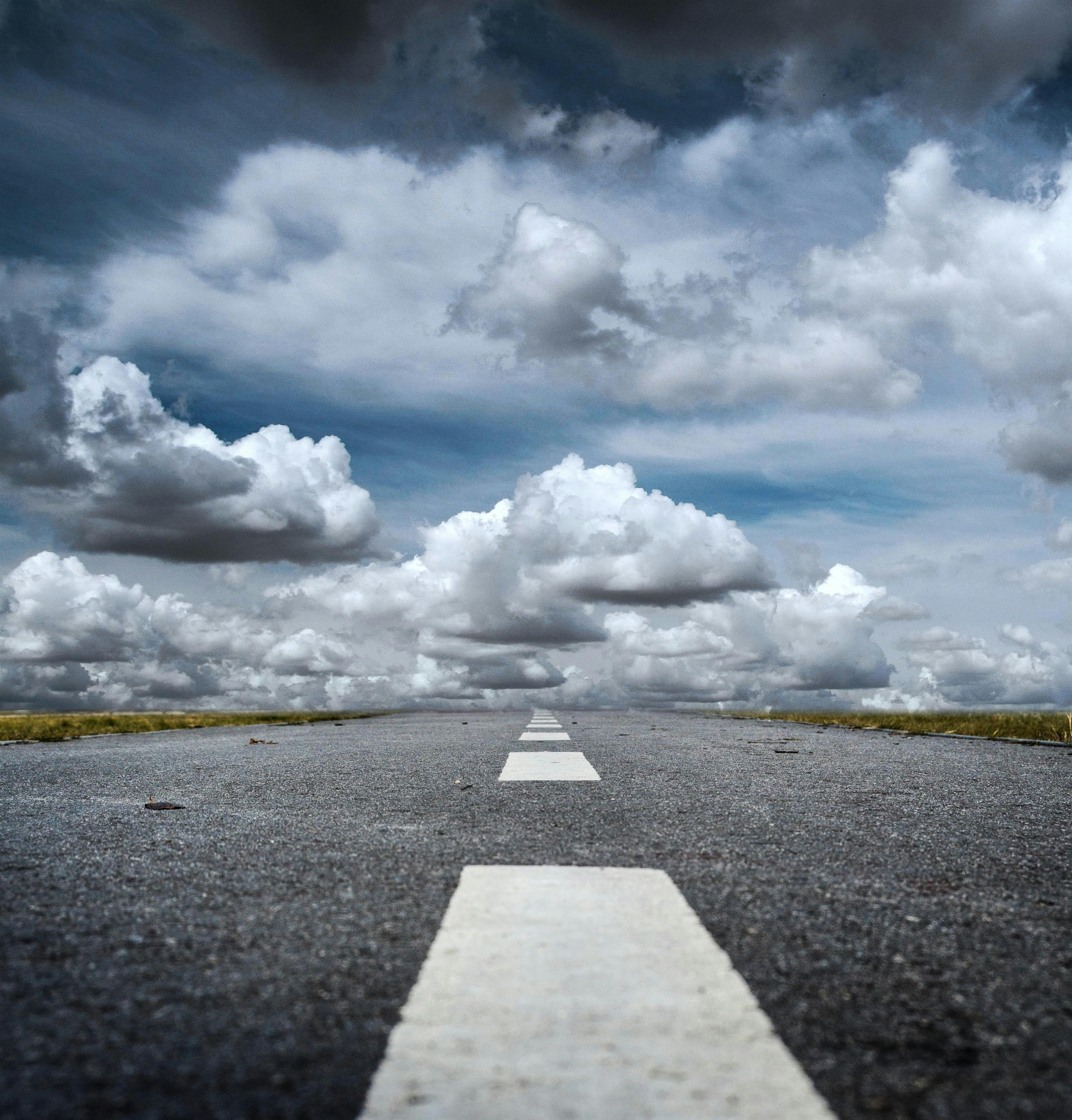 Gray Rolled Asphalt Road under Cloudy Sky · Free Stock Photo