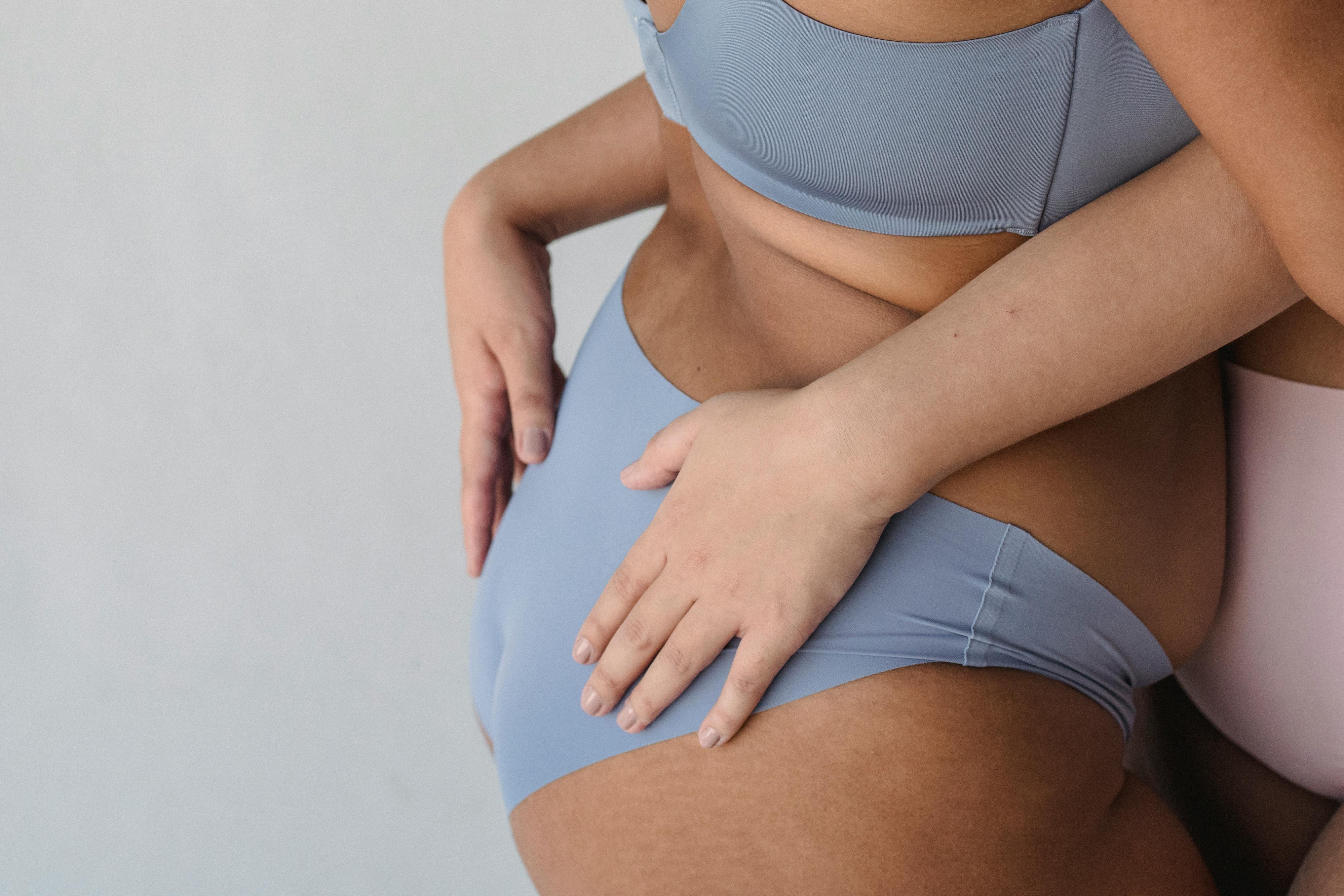 Woman in her underwear - Stock Image - F002/5094 - Science Photo Library