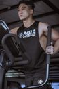 Strong sportsman training on machine