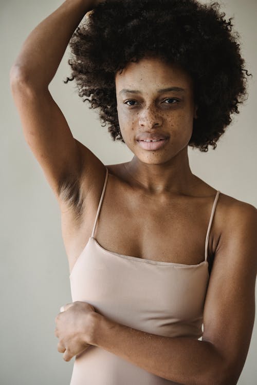 Young Woman in a Nude Tank Top 