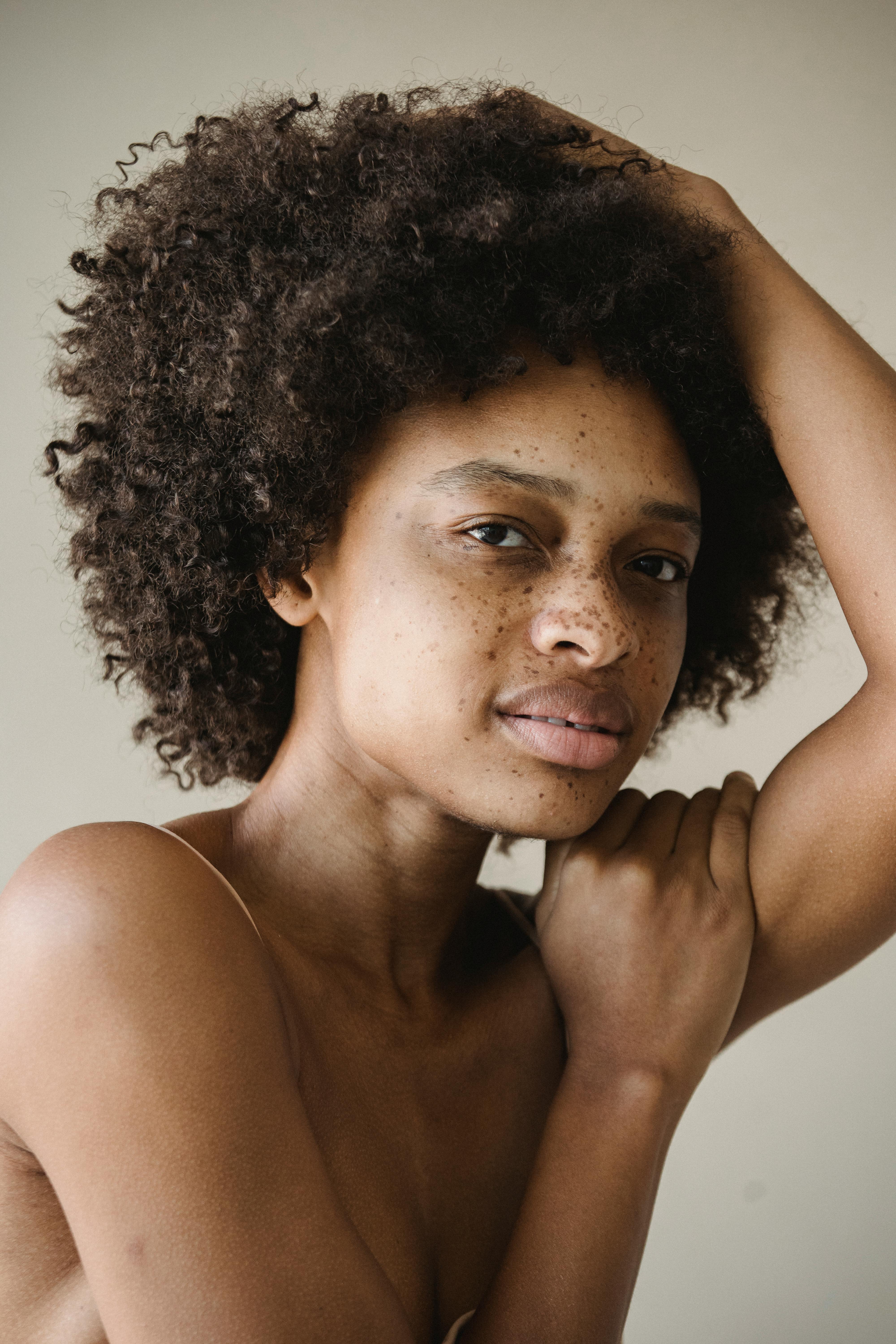 portrait of a young woman with afro hair