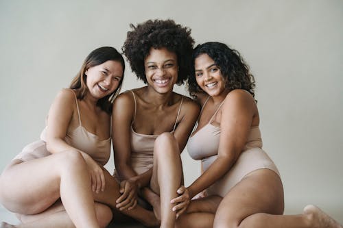 Portrait of Women Sitting in Underwear