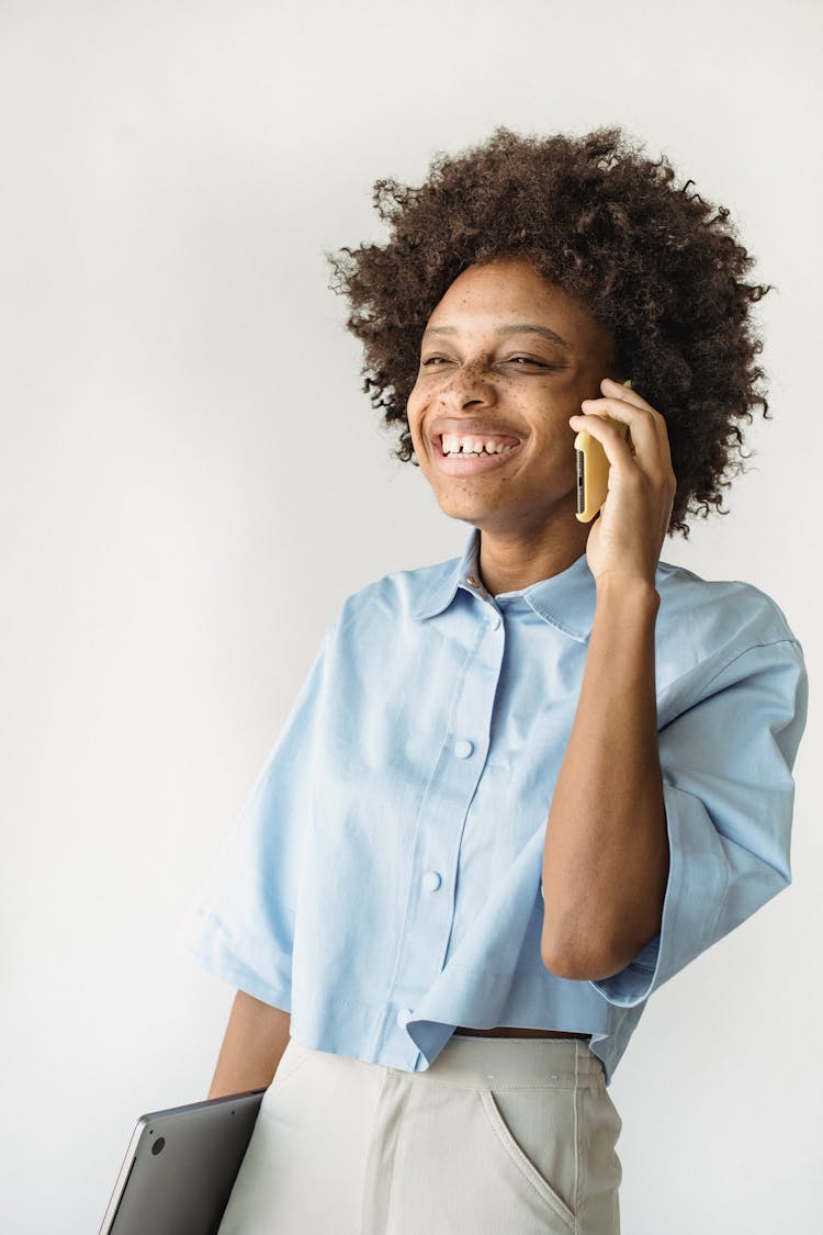 Smiling Woman Talking On Phone