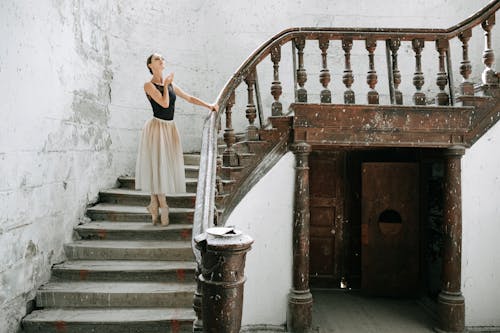 Ballerina Holding on a Handrail