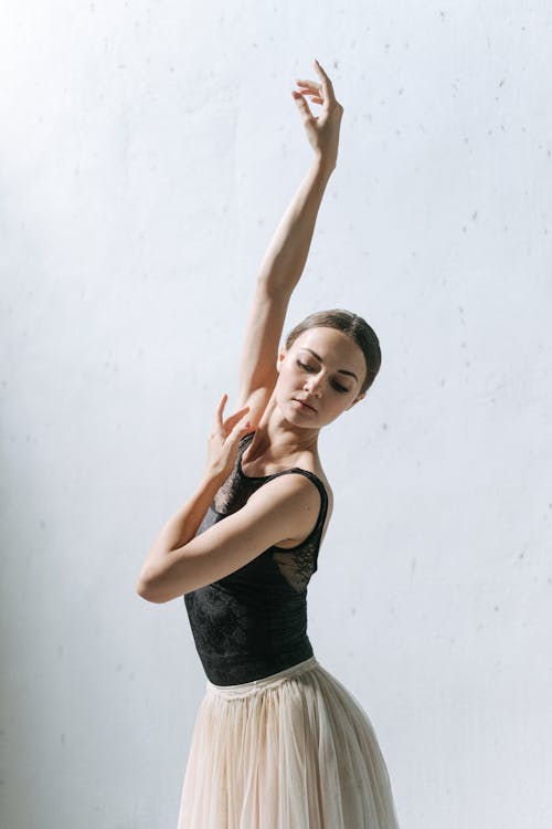 Ballerina in Black Top and White Skirt