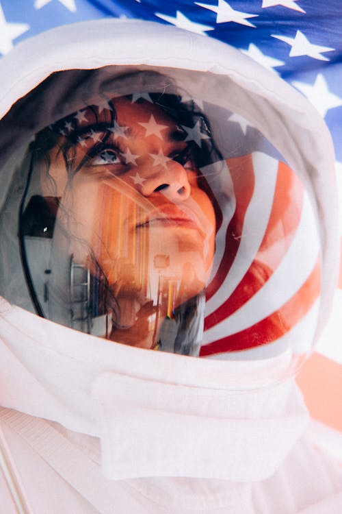 Close-Up Photo Of A Woman In A Space Suit