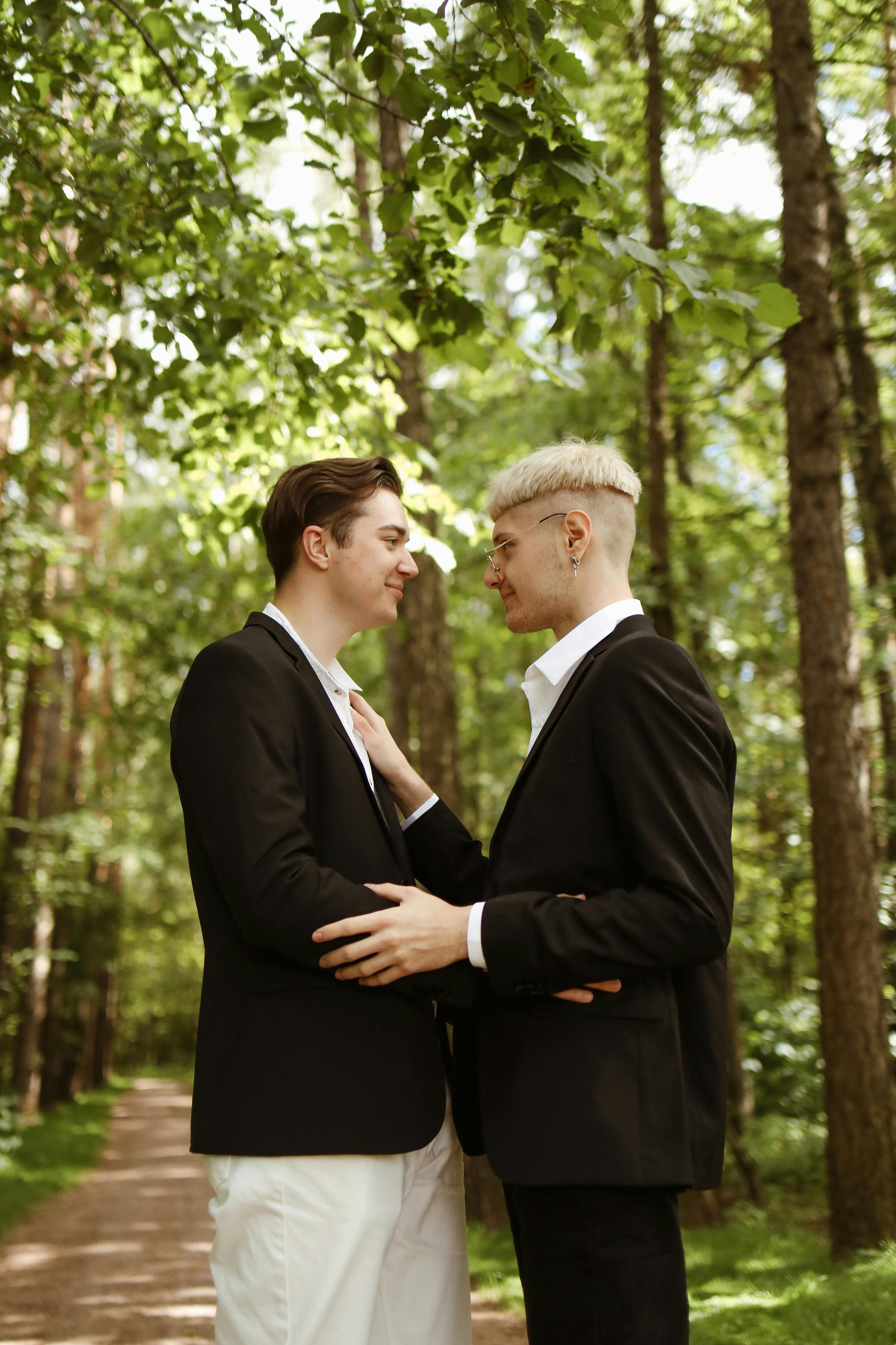 couple standing face to face smiling