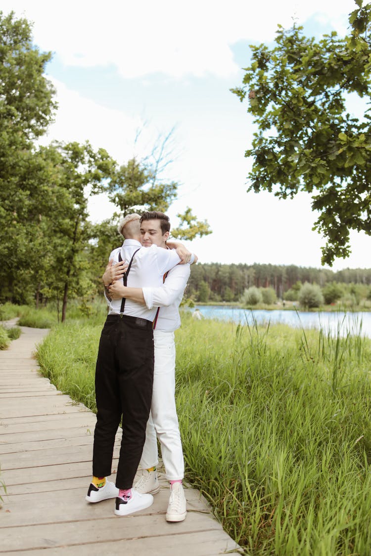 Men Hugging Each Other