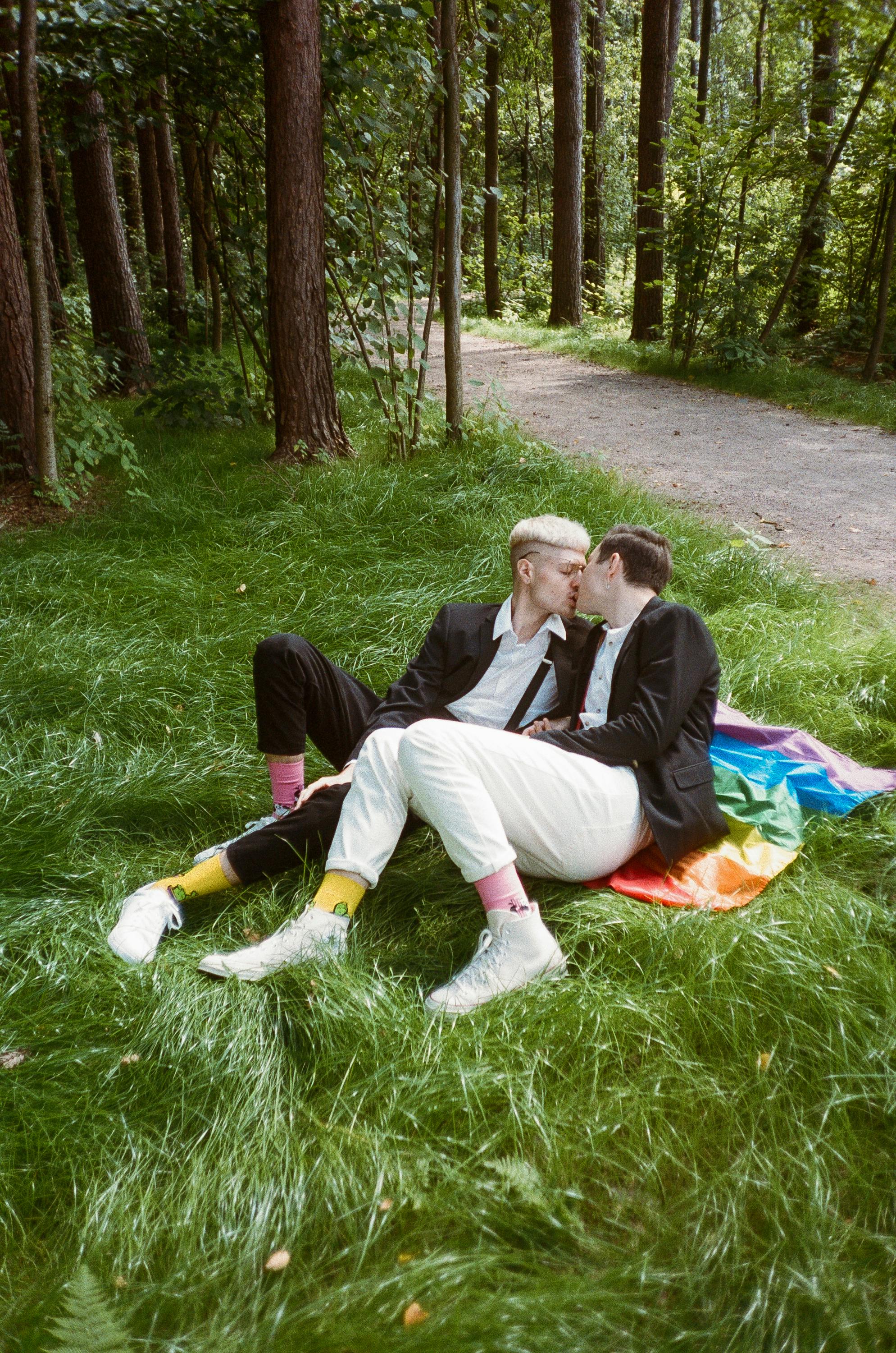 Two Men Kissing at Each Other · Free Stock Photo