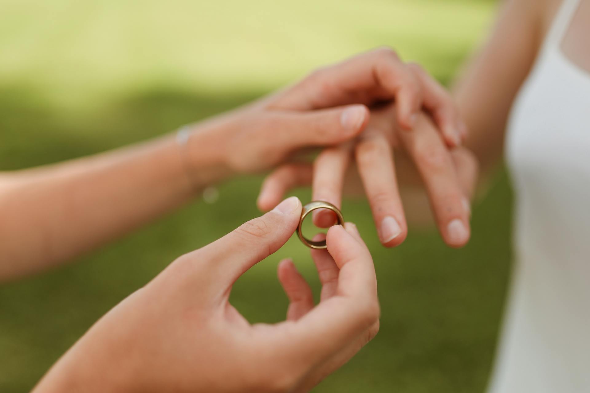 A Person Holding a Wedding Ring