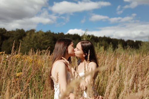 Free 
Women Kissing Each Other Stock Photo