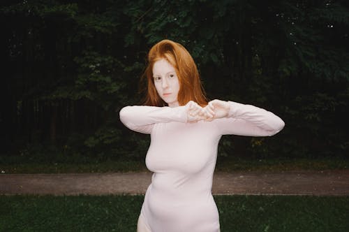 A Woman wearing Long Sleeve with Red Head