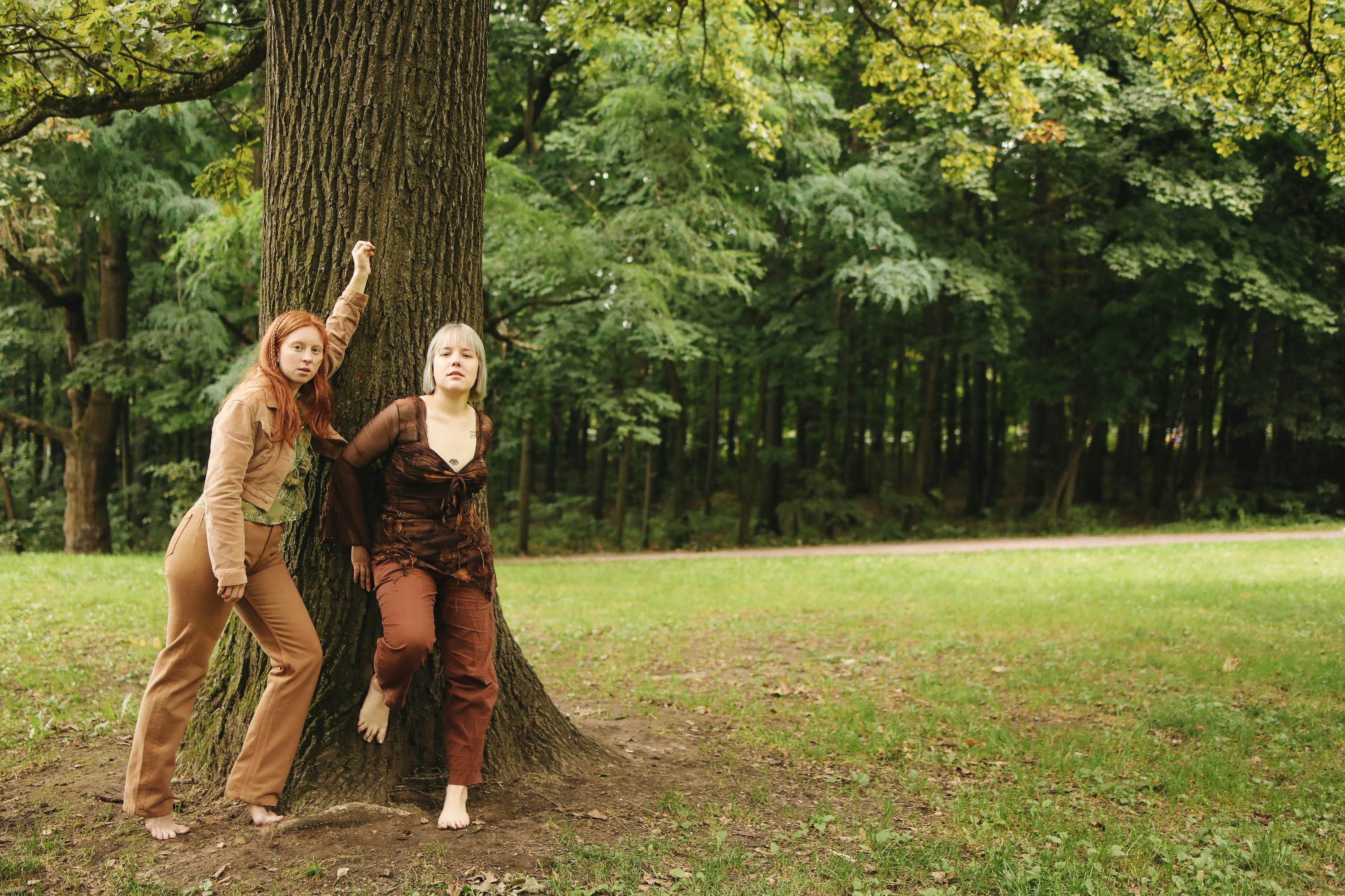 Brown Clothing In A Natural Outdoor Setting, Emphasizing Earth Tones And Stability