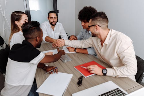 Free Group Of People Shaking Hands Stock Photo
