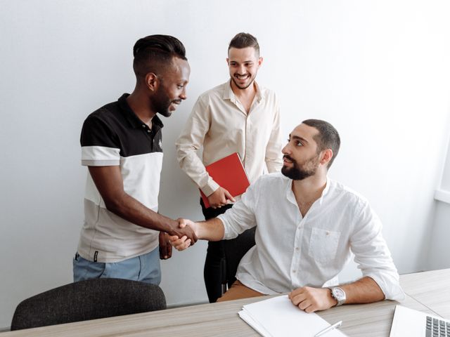 Business team collaborating in an office on a long-term supply arrangement