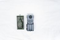 Gray Camera on White Surface