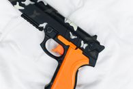 Black and Brown Semi Automatic Pistol