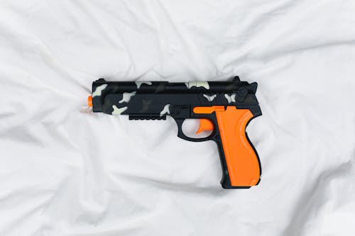 Free Toy Gun on White Background Stock Photo
