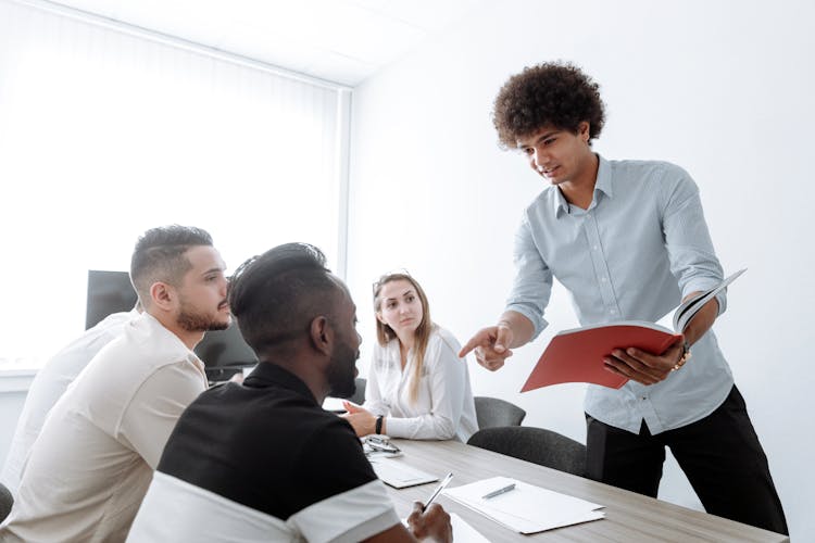 Office Team Having A Meeting In The Room