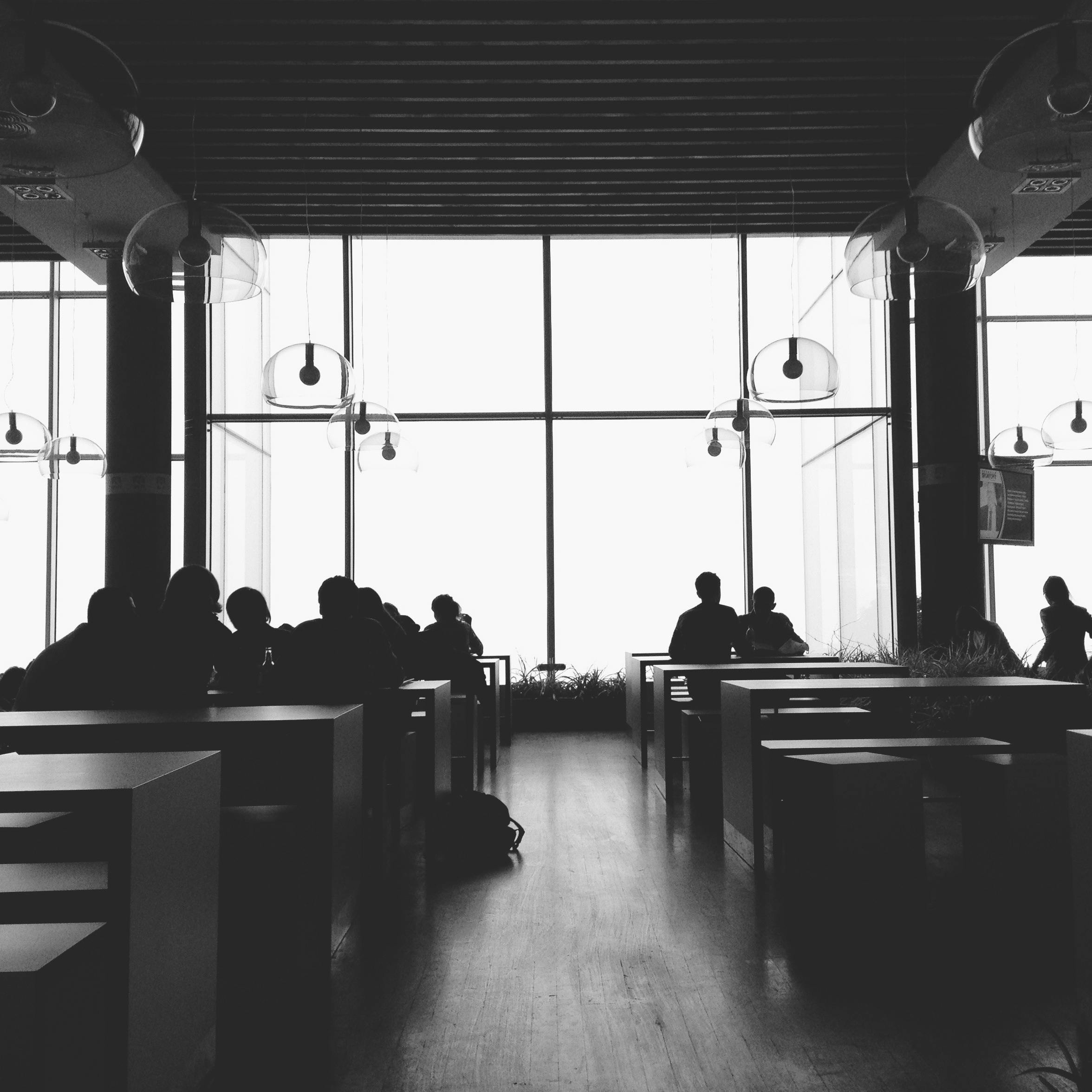 silhouette of people in building