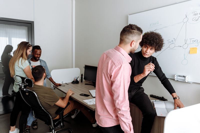 Cybersecurity team collaborating in modern office