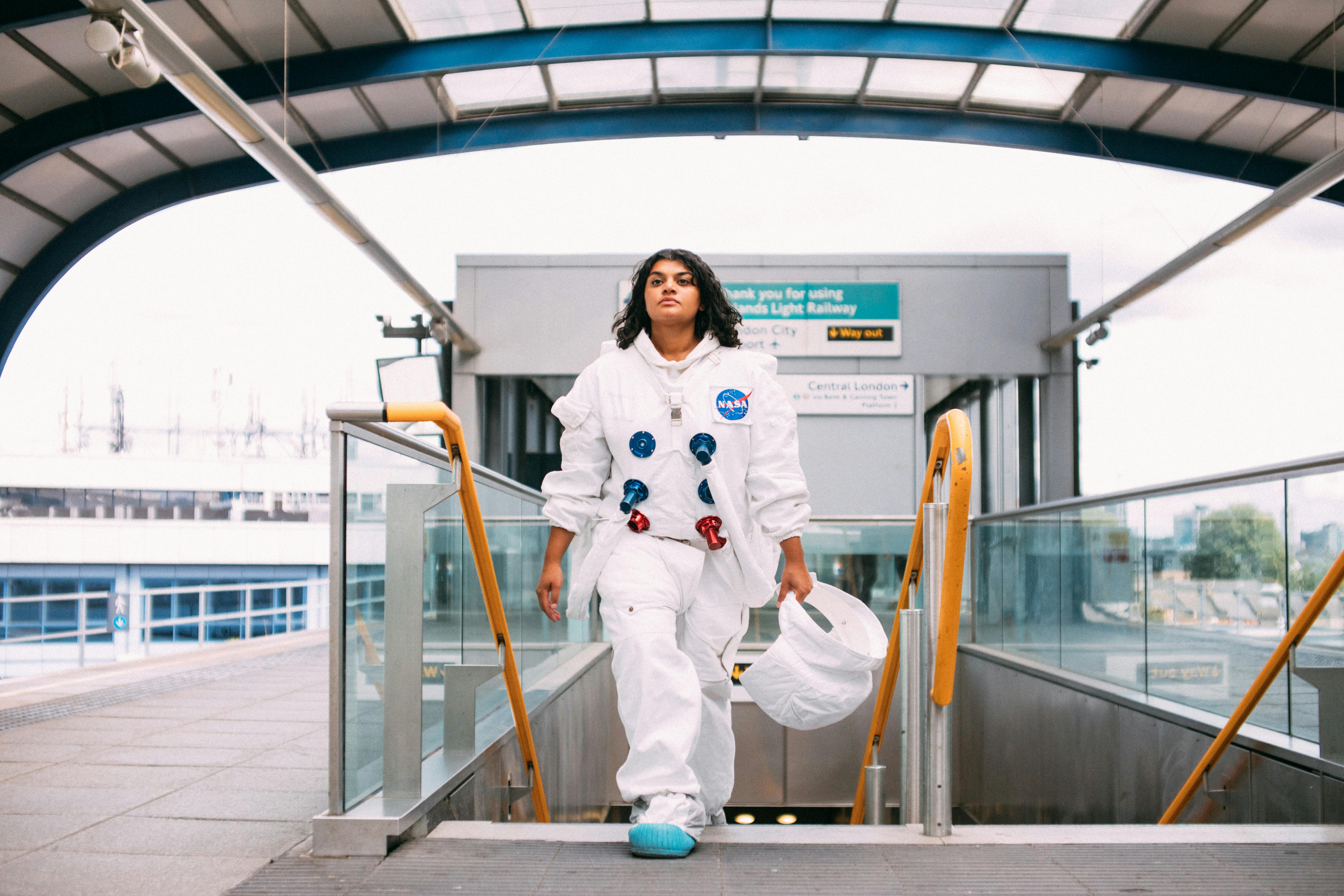 woman in a costume at the train station