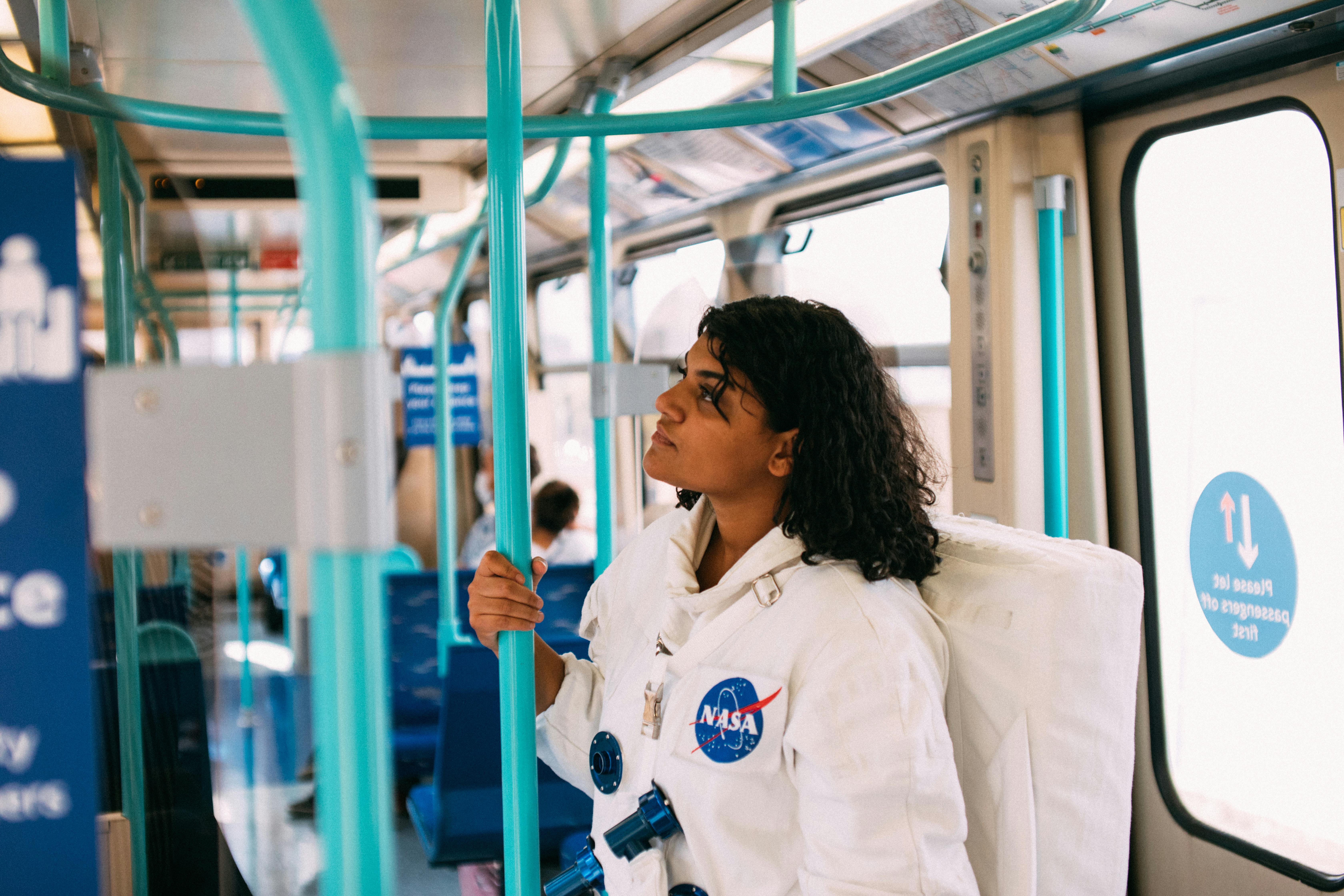 Woman In A Costume Inside A Train