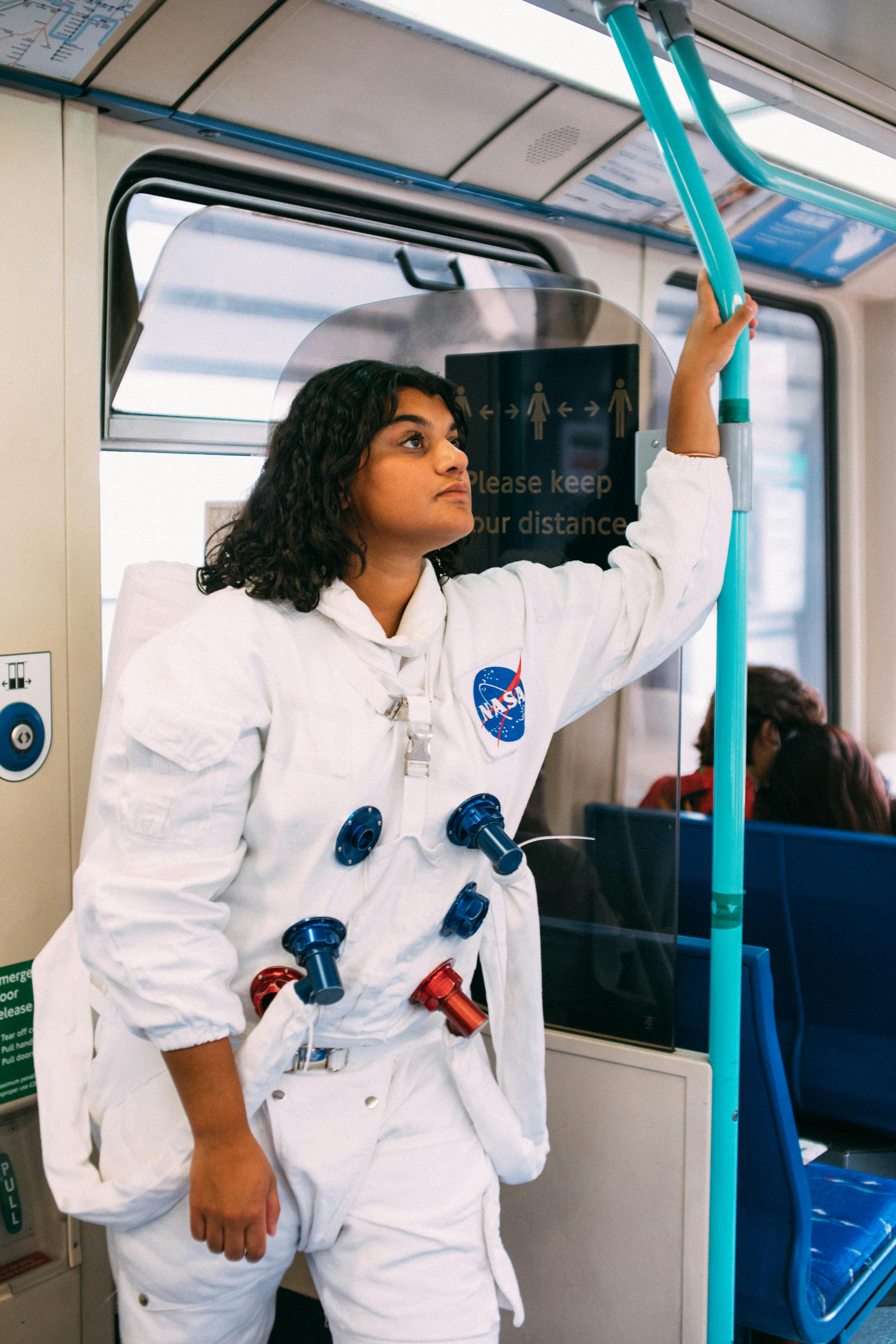 woman wearing an astronaut costume