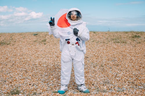 Man In A Space Suit Doing A Peace Sign