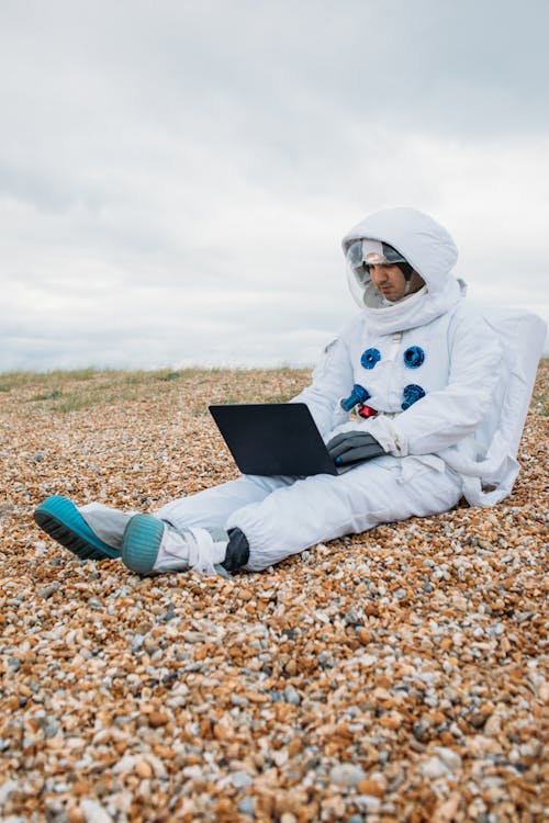 Free Astronaut Using a Laptop Stock Photo