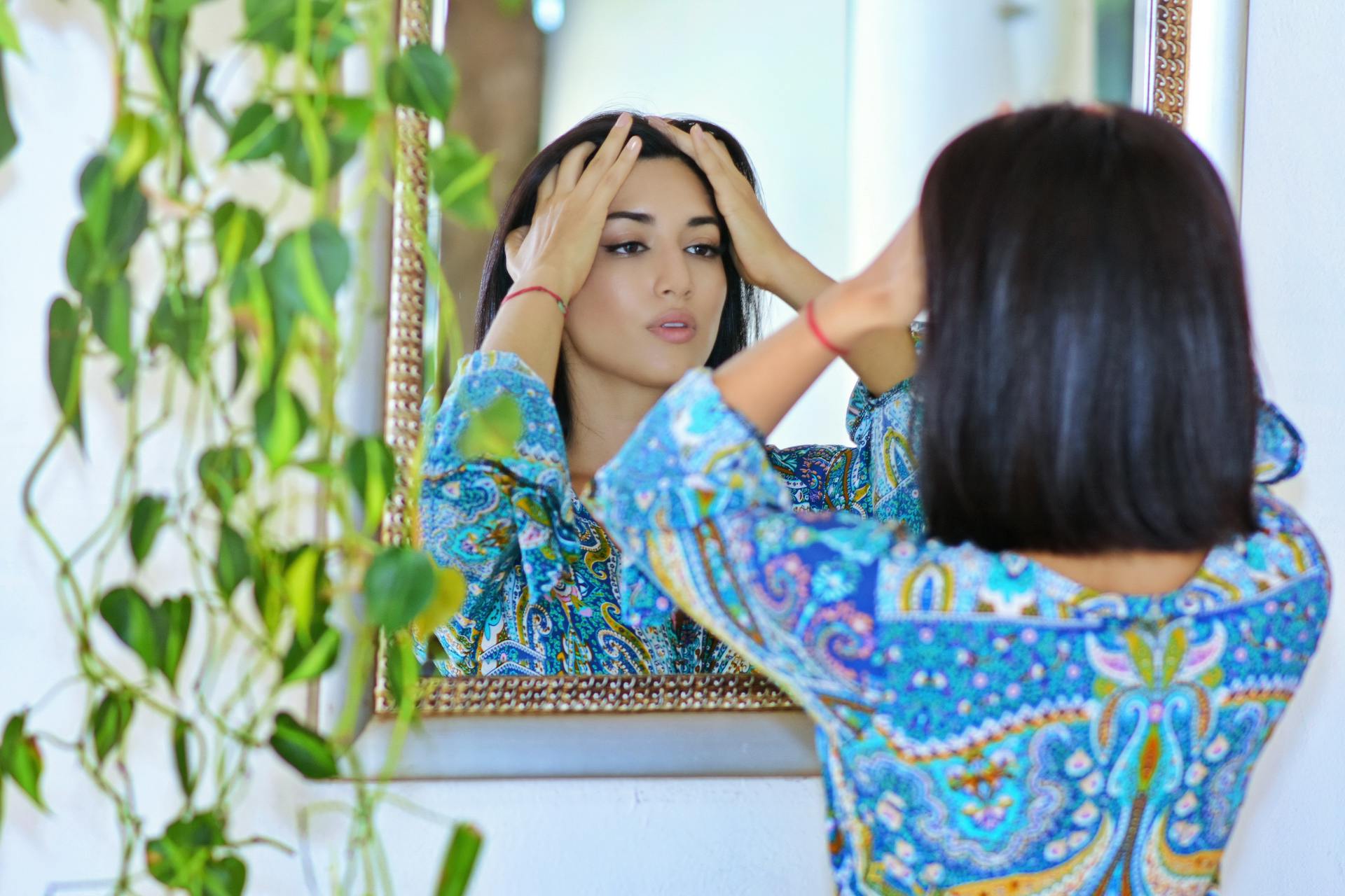 Woman in Blue Paisley Print Dress