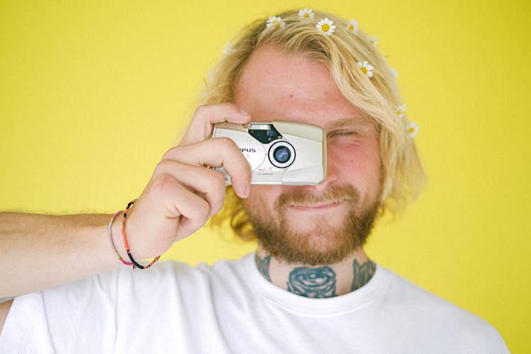 Young Blond Man With Photo Camera