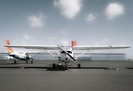 Modern propeller aircraft parked on aerodrome