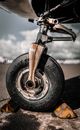 Airplane wheel with chocks on in airport